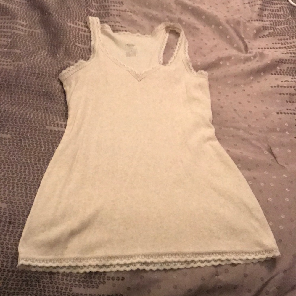 Lace trimmed tank fits like a large